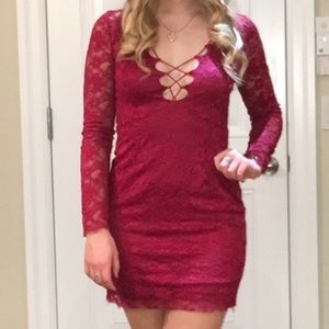 Red lace dress by “Dress Forum” brand based in LA